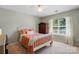 Bright bedroom with large window, carpet and a ceiling fan at 820 Settlement St, Clover, SC 29710