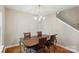Dining room featuring wood floors, dining table and chandelier at 820 Settlement St, Clover, SC 29710