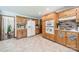 Well-equipped kitchen featuring tiled floors and an oven at 8698 Rocky River Rd, Harrisburg, NC 28075