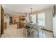 Spacious kitchen with an island table that includes seating at 8698 Rocky River Rd, Harrisburg, NC 28075