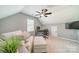 Office with a desk, computer, seating, ceiling fan and natural light at 8698 Rocky River Rd, Harrisburg, NC 28075