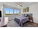 Cozy bedroom with skyline views, dark hardwood floors, and a comfortable queen bed at 919 Cityscape Dr, Charlotte, NC 28205