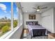 Bright bedroom featuring skyline views, modern decor, and a comfortable queen bed at 919 Cityscape Dr, Charlotte, NC 28205