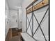 Inviting entryway with coat rack bench and convenient access to various rooms, offering a practical and stylish welcome at 919 Cityscape Dr, Charlotte, NC 28205