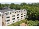 Modern townhome complex with rooftop decks, well-manicured lawns, and contemporary design, perfect for urban living at 919 Cityscape Dr, Charlotte, NC 28205