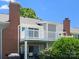 Exterior view of home with brick chimney and balcony with white railing at 9404 S Vicksburg Park Ct, Charlotte, NC 28210