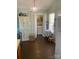 Functional kitchen area featuring a pantry, laundry closet, and modern appliances at 9612 Farmridge Ln, Matthews, NC 28105