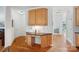 Cozy office nook with granite countertop, wood cabinets, and ample lighting, perfect for work or study at 11917 Ulsten Ln, Huntersville, NC 28078