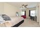 Bedroom with carpet, ceiling fan, and natural light from two large windows at 1329 Jacemans Way, Cornelius, NC 28031