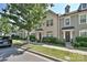 Charming townhomes with landscaped yards, welcoming entryways, and neat sidewalks at 1329 Jacemans Way, Cornelius, NC 28031