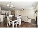 Open-concept living space featuring a fireplace and dining area at 1329 Jacemans Way, Cornelius, NC 28031