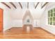 Bright attic space with exposed beams, hardwood floors, and natural light at 1400 Matheson Ave, Charlotte, NC 28205
