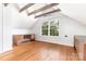 Unique attic space features wood beams and an abundance of natural light at 1400 Matheson Ave, Charlotte, NC 28205