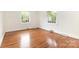 Cozy bedroom featuring hardwood floors and bright windows for natural light at 1400 Matheson Ave, Charlotte, NC 28205