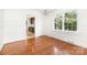 Inviting dining room with hardwood floors, white walls, and a chandelier for an elegant touch at 1400 Matheson Ave, Charlotte, NC 28205