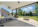Covered patio featuring a ceiling fan, dining table, and backyard views at 1478 Imperial Ct, York, SC 29745