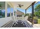 A covered patio featuring a ceiling fan and a table with chairs at 1478 Imperial Ct, York, SC 29745
