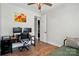Well lit bedroom has an office setup and also leads to a walk in closet and ensuite bath at 1478 Imperial Ct, York, SC 29745