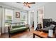 Bedroom features a daybed, wood ceiling fan, and access to an en suite bathroom and walk-in closet at 1478 Imperial Ct, York, SC 29745