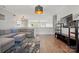 Comfortable living room with a large sectional sofa, modern lighting, and stylish decor accents at 1478 Imperial Ct, York, SC 29745