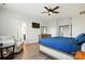 Spacious main bedroom features a cozy armchair, dresser, and en-suite bathroom access at 1478 Imperial Ct, York, SC 29745