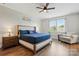 Relaxing main bedroom with a plush bed, modern decor, and a sitting area with natural light at 1478 Imperial Ct, York, SC 29745