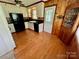 View of kitchen featuring wooden cabinets and vinyl flooring at 1585 Salem Church Rd, Lincolnton, NC 28092