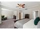 Large bedroom with a sitting area, dresser, walk-in closet and ensuite bathroom at 1805 Sutter Creek Dr, Waxhaw, NC 28173
