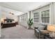 Expansive bedroom with a sitting area, large windows, and an abundance of natural light at 1805 Sutter Creek Dr, Waxhaw, NC 28173