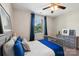 Comfortable bedroom with a decorative dresser and natural light from the window at 1805 Sutter Creek Dr, Waxhaw, NC 28173