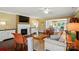 Bright living room with hardwood floors, a fireplace, and view to other rooms at 1974 Links View Dr, Fort Mill, SC 29707