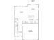 First floor plan featuring the living room, kitchen, foyer, and garage at 2023 Sadler Woods Ln, Charlotte, NC 28214