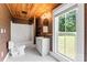 Charming bathroom featuring a shower-tub combo, vanity, and black and white tile floor at 233 Sellars Rd, Kings Mountain, NC 28086