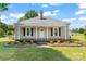 Charming single-story home with a welcoming front porch and beautifully landscaped flower beds at 233 Sellars Rd, Kings Mountain, NC 28086