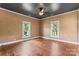 Bright living room featuring hardwood floors, natural lighting, and a cozy atmosphere at 233 Sellars Rd, Kings Mountain, NC 28086