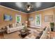 Staged living room with hardwood floors, neutral furniture, and a cozy, inviting ambiance at 233 Sellars Rd, Kings Mountain, NC 28086