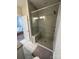 Luxurious bathroom with walk-in shower, marble tile, and a serene ambiance at 3007 Citizens Ln, Charlotte, NC 28205