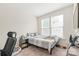 Well-lit bedroom featuring plush carpeting and a comfortable bed at 3007 Citizens Ln, Charlotte, NC 28205