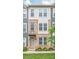 Charming townhouse with brick and siding exterior, featuring a welcoming entrance and well-maintained landscaping at 3007 Citizens Ln, Charlotte, NC 28205