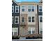 Charming townhome with brick facade and inviting entryway, perfect for modern living at 3007 Citizens Ln, Charlotte, NC 28205