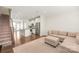 Spacious open-concept living area with hardwood floors, connecting the kitchen and a cozy living room at 3007 Citizens Ln, Charlotte, NC 28205