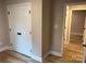 A view of a bedroom entrance highlighting a large closet with white double doors at 32874 Old Salisbury Rd, Albemarle, NC 28001
