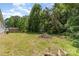 Spacious backyard with storage shed and natural wooded area at 3585 Woodstream Dr, Maiden, NC 28650