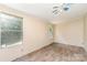 Bedroom features wood-look floors, natural lighting, and a ceiling fan at 3585 Woodstream Dr, Maiden, NC 28650