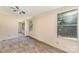 Bedroom features wood-look floors, natural lighting, and a ceiling fan at 3585 Woodstream Dr, Maiden, NC 28650