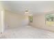 Bedroom featuring neutral carpet, ceiling fan, and a view of the backyard at 3585 Woodstream Dr, Maiden, NC 28650