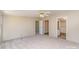 Bedroom featuring neutral carpet, ceiling fan, and adjacent bathroom at 3585 Woodstream Dr, Maiden, NC 28650