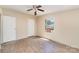 Bedroom featuring a wood-look floor, ceiling fan, and a view of the backyard at 3585 Woodstream Dr, Maiden, NC 28650