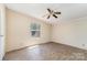 Bedroom featuring a wood-look floor, ceiling fan, and a view of the backyard at 3585 Woodstream Dr, Maiden, NC 28650