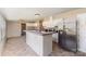 Traditional kitchen features a breakfast bar, tile flooring, lots of cabinet space, and stainless steel appliances at 3585 Woodstream Dr, Maiden, NC 28650